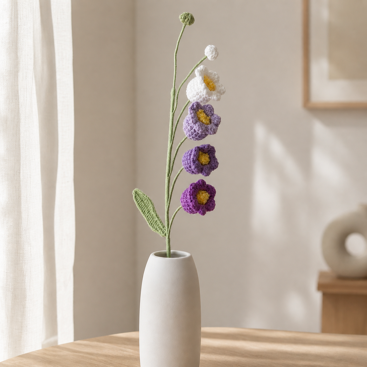 Handmade crochet gradient purple bellflower stem in a white vase