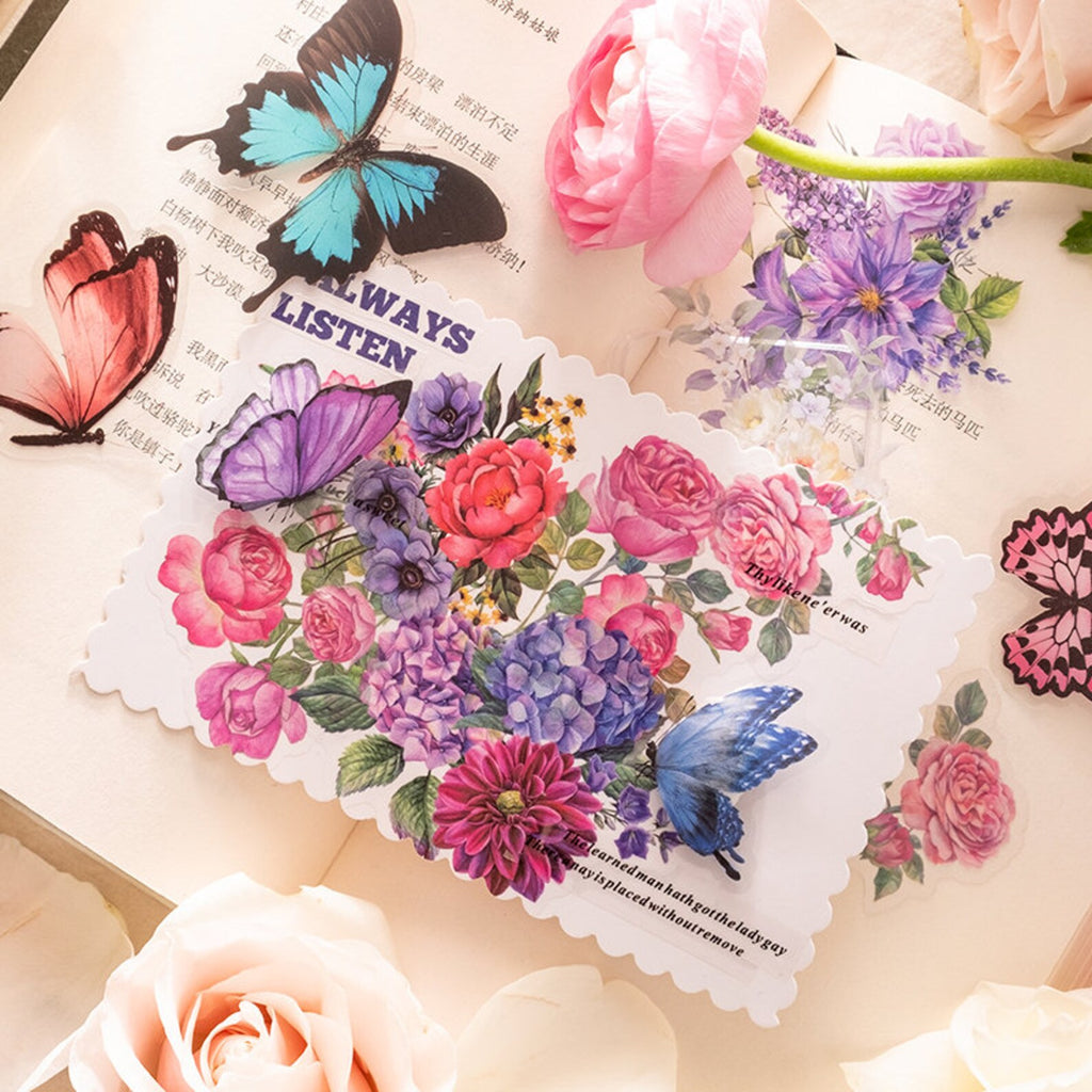 Watercolor butterfly and floral stickers in a journal layout