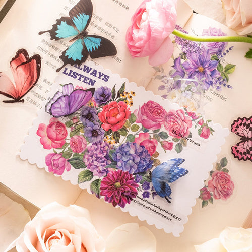 Watercolor butterfly and floral stickers in a journal layout