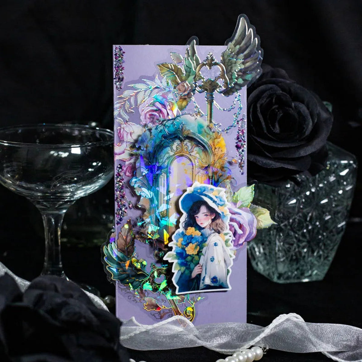 Holographic key sticker used in a decorative collage