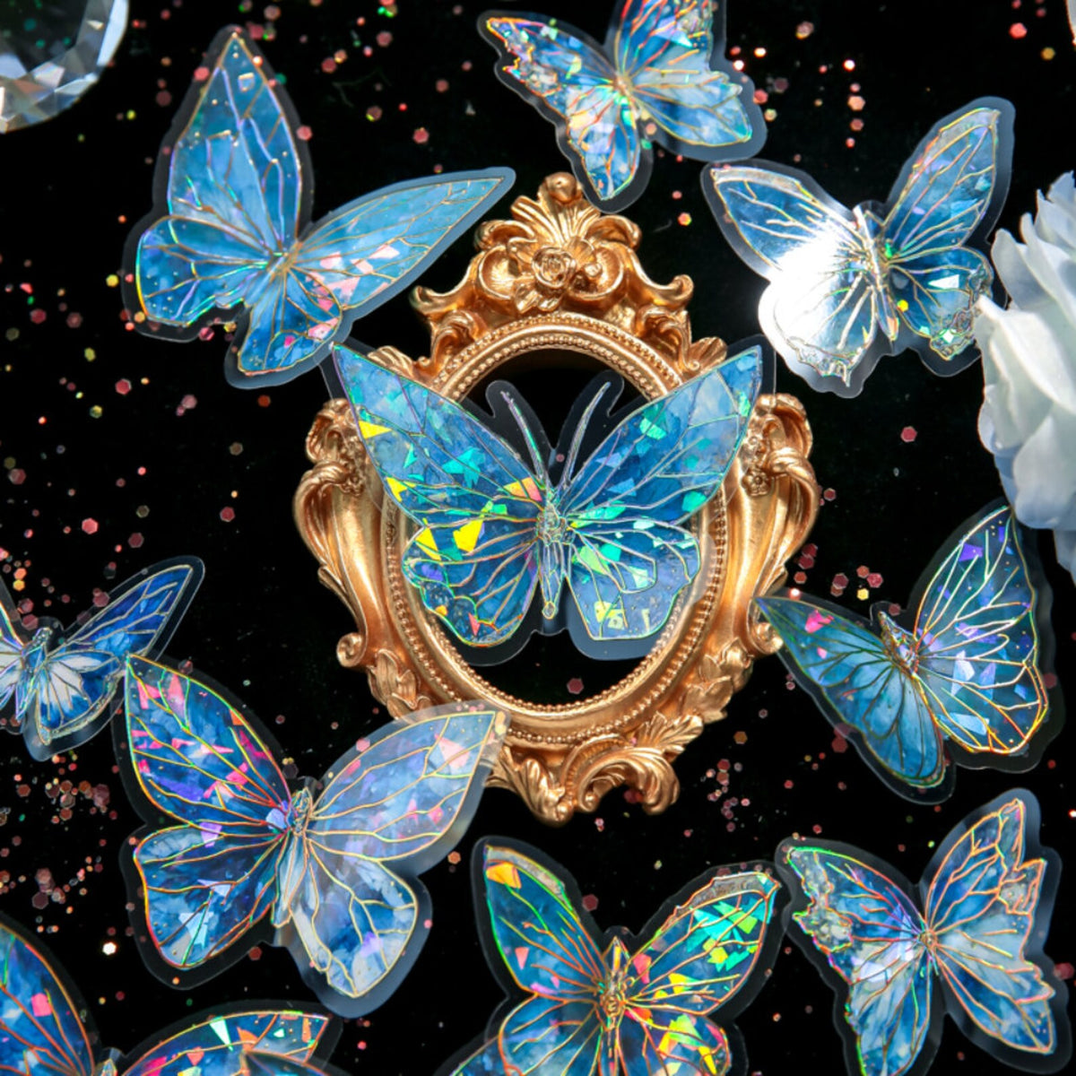 Holographic butterfly stickers around a decorative frame